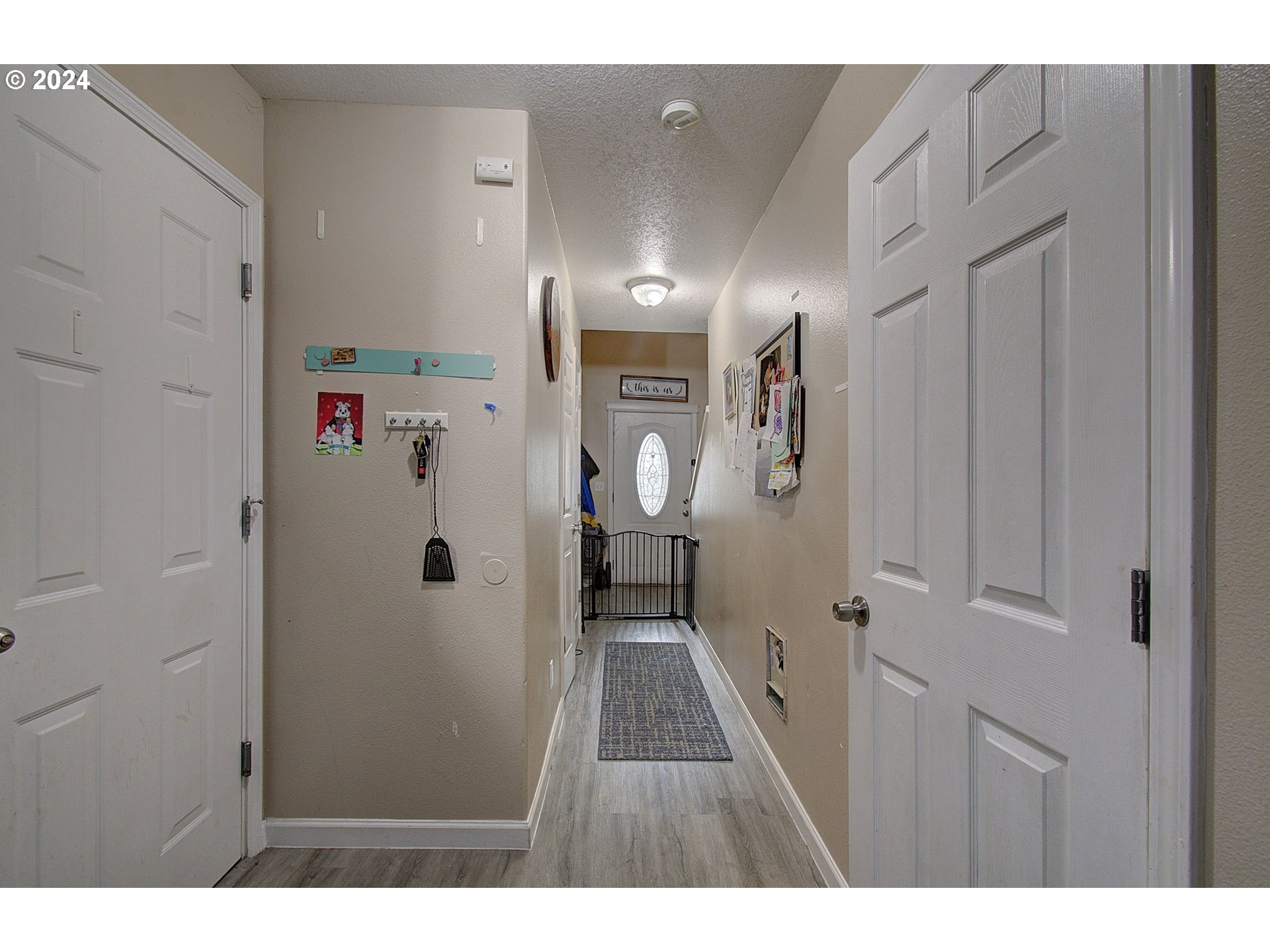2010 Northeast Stapleton Road Vancouver, WA 98661 - Photo 6 of 26 a view of a hallway with wooden floor