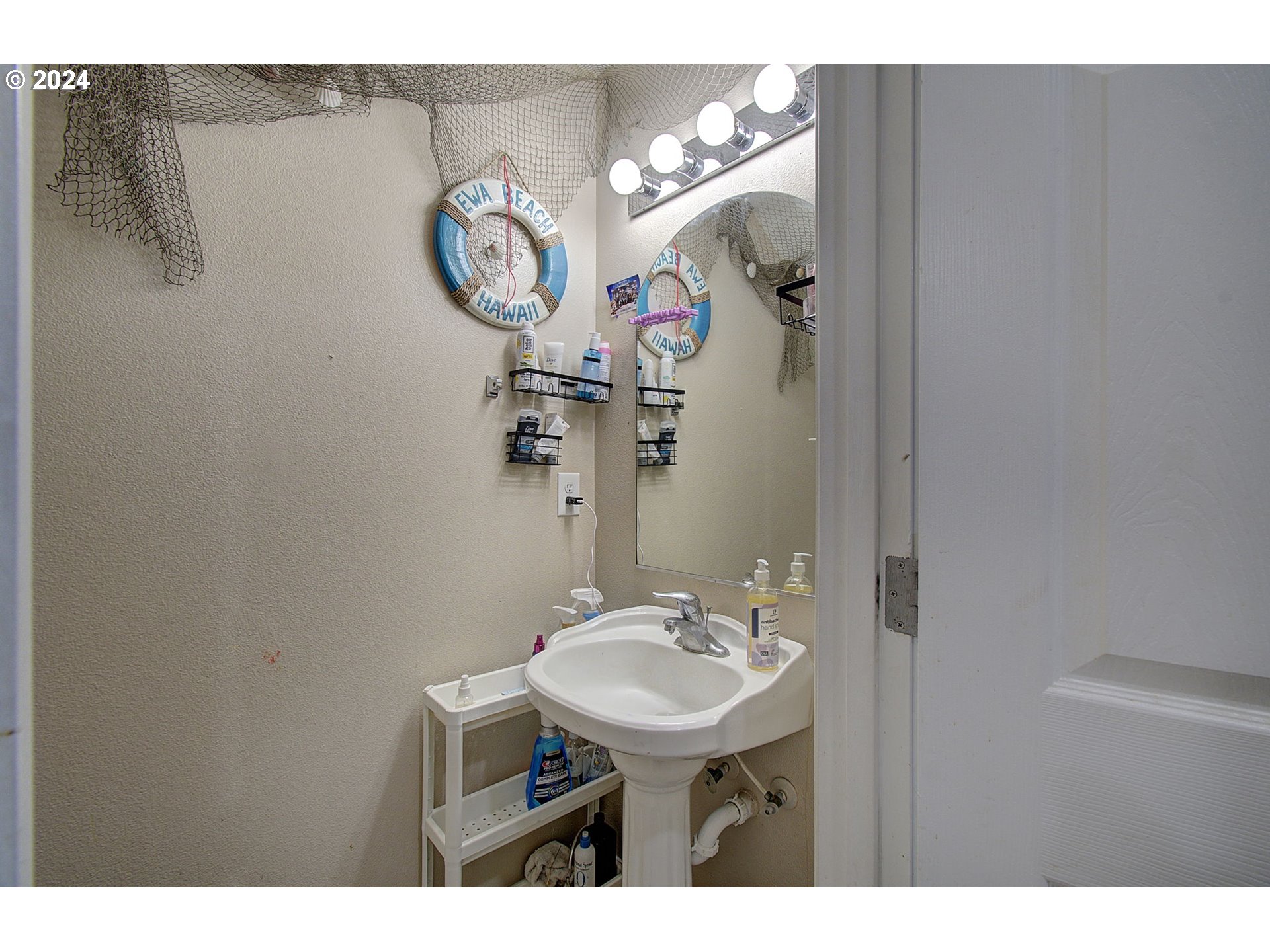 2010 Northeast Stapleton Road Vancouver, WA 98661 - Photo 10 of 26 a bathroom with a sink and a mirror