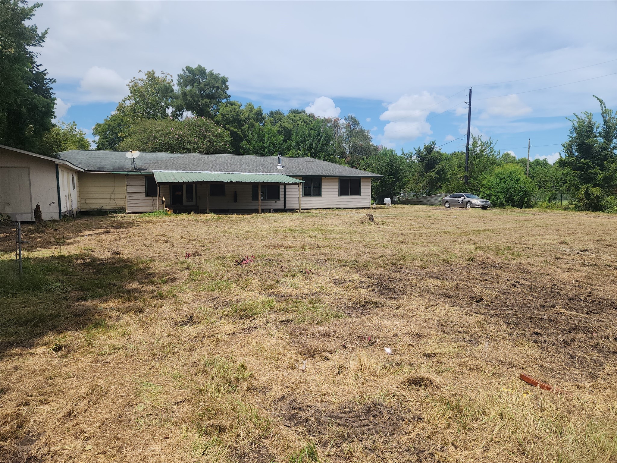 14115 Bohemian Hall Road Crosby, TX 77532 - Photo 3 of 22 a house with a yard