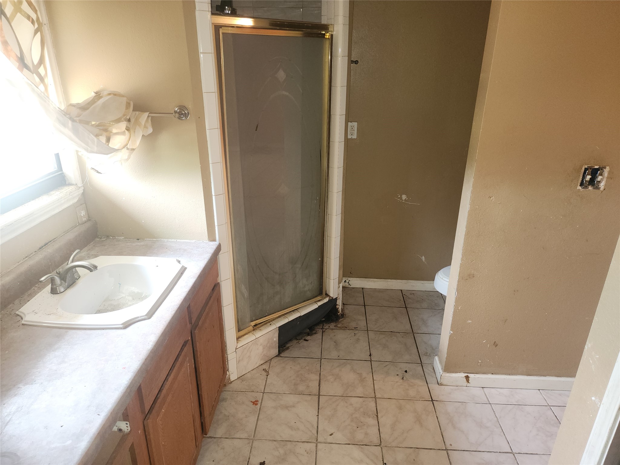 14115 Bohemian Hall Road Crosby, TX 77532 - Photo 10 of 22 a bathroom with a granite countertop sink and a mirror
