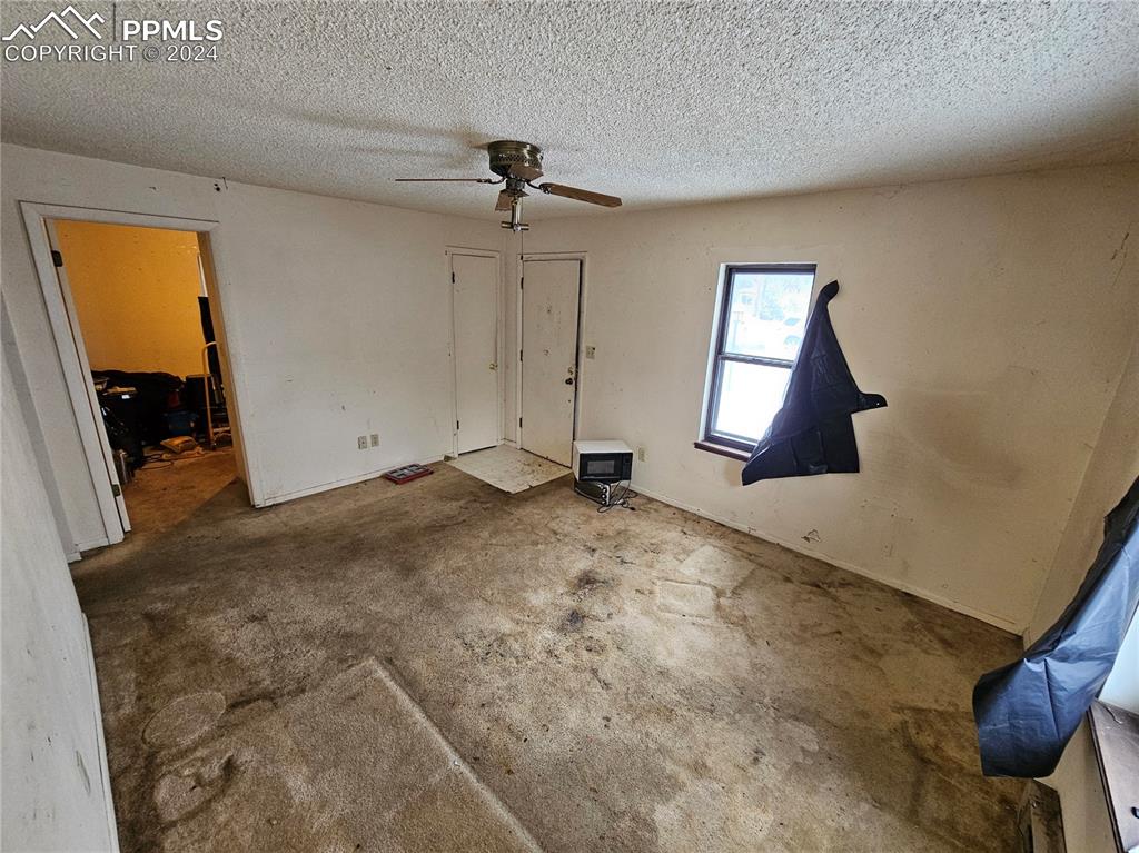 812 Alexander Road Colorado Springs, CO 80909 - Photo 7 of 8 a view of an empty room