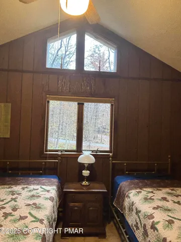 a bathroom with a toilet and shower