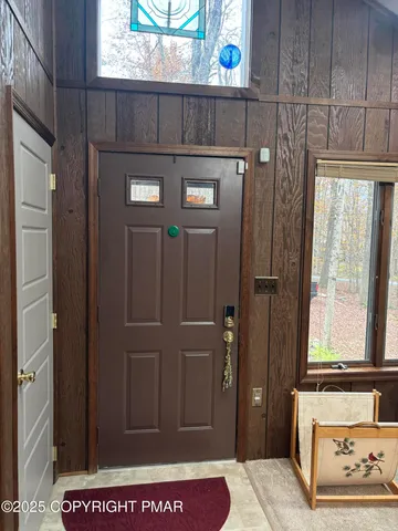 a kitchen with stainless steel appliances a sink and a refrigerator