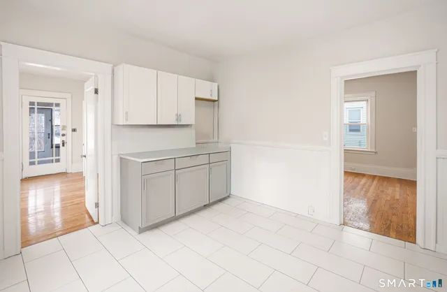 a kitchen with a sink and a window