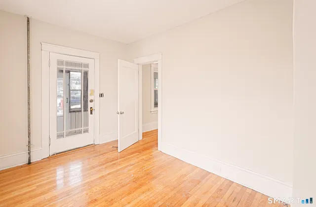 a view of a bedroom from the hallway