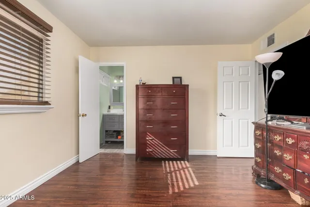 wooden floor and windows in an empty room