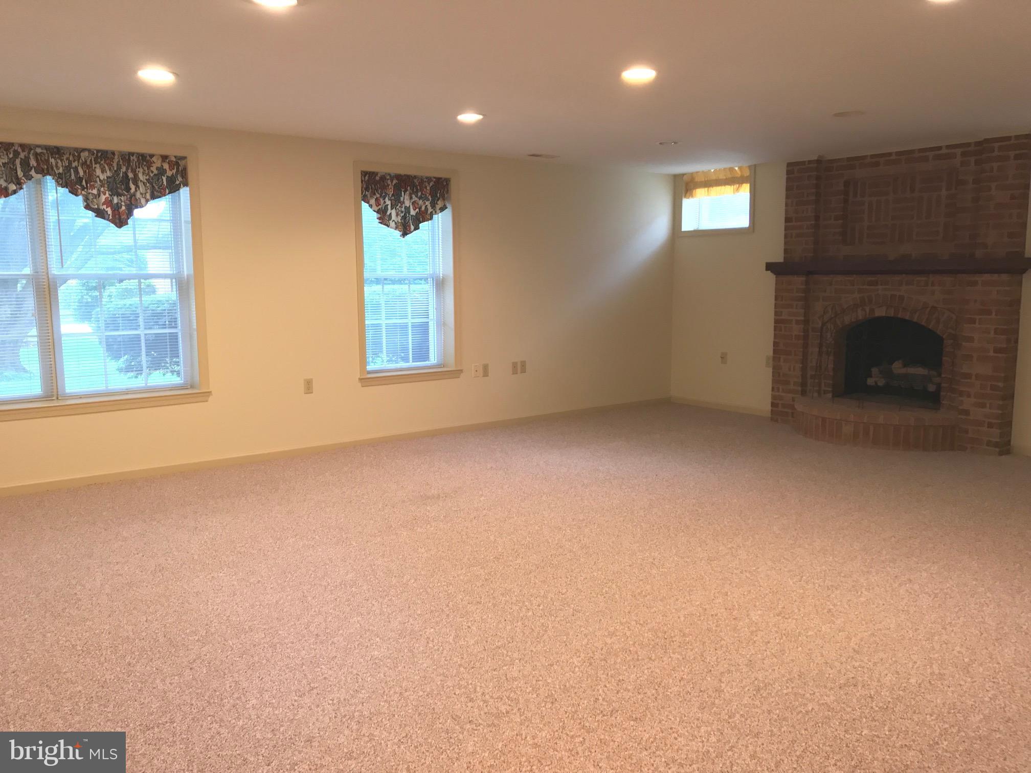 1208 Rodes Circle Winchester, VA 22601 - Photo 21 of 26 Large Rec Room with Full Windows, Fireplace, Bath