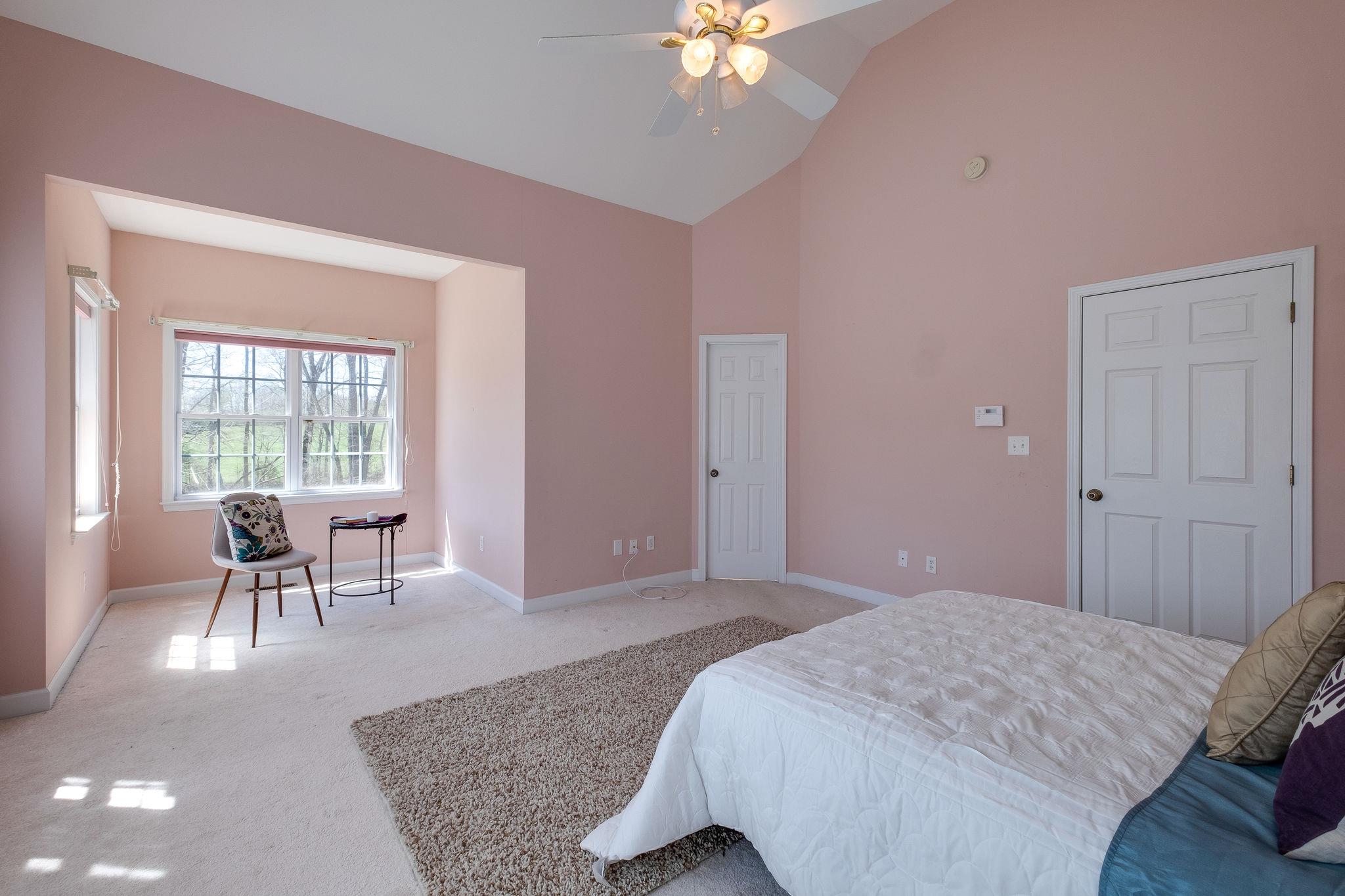 1175 Tidwell Switch Road Dickson, TN 37055 - Photo 16 of 27 a bedroom with a bed and furniture