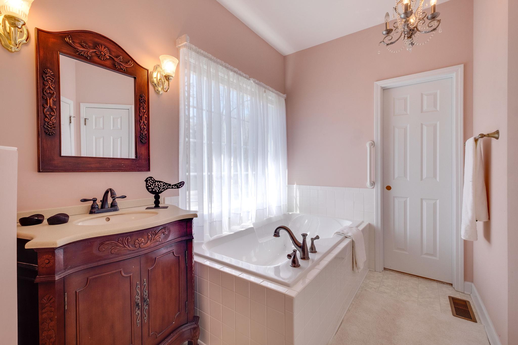 1175 Tidwell Switch Road Dickson, TN 37055 - Photo 17 of 27 a bathroom with a sink and a mirror