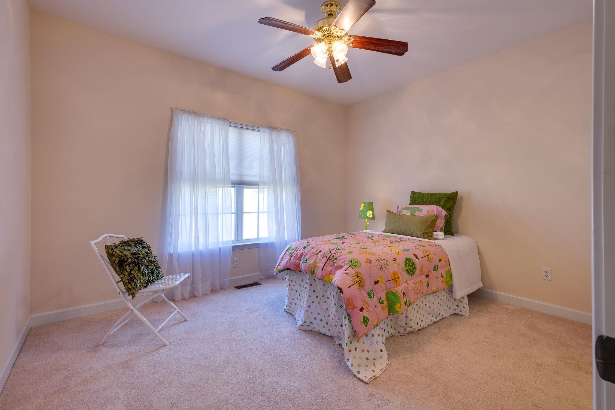 1175 Tidwell Switch Road Dickson, TN 37055 - Photo 18 of 27 a bedroom with a bed and a window