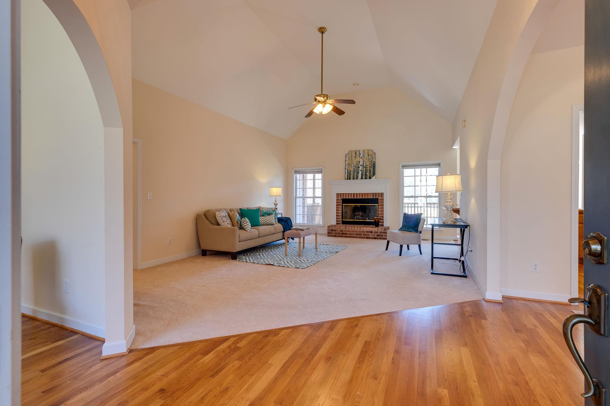 1175 Tidwell Switch Road Dickson, TN 37055 - Photo 3 of 27 a living room with furniture and a fireplace