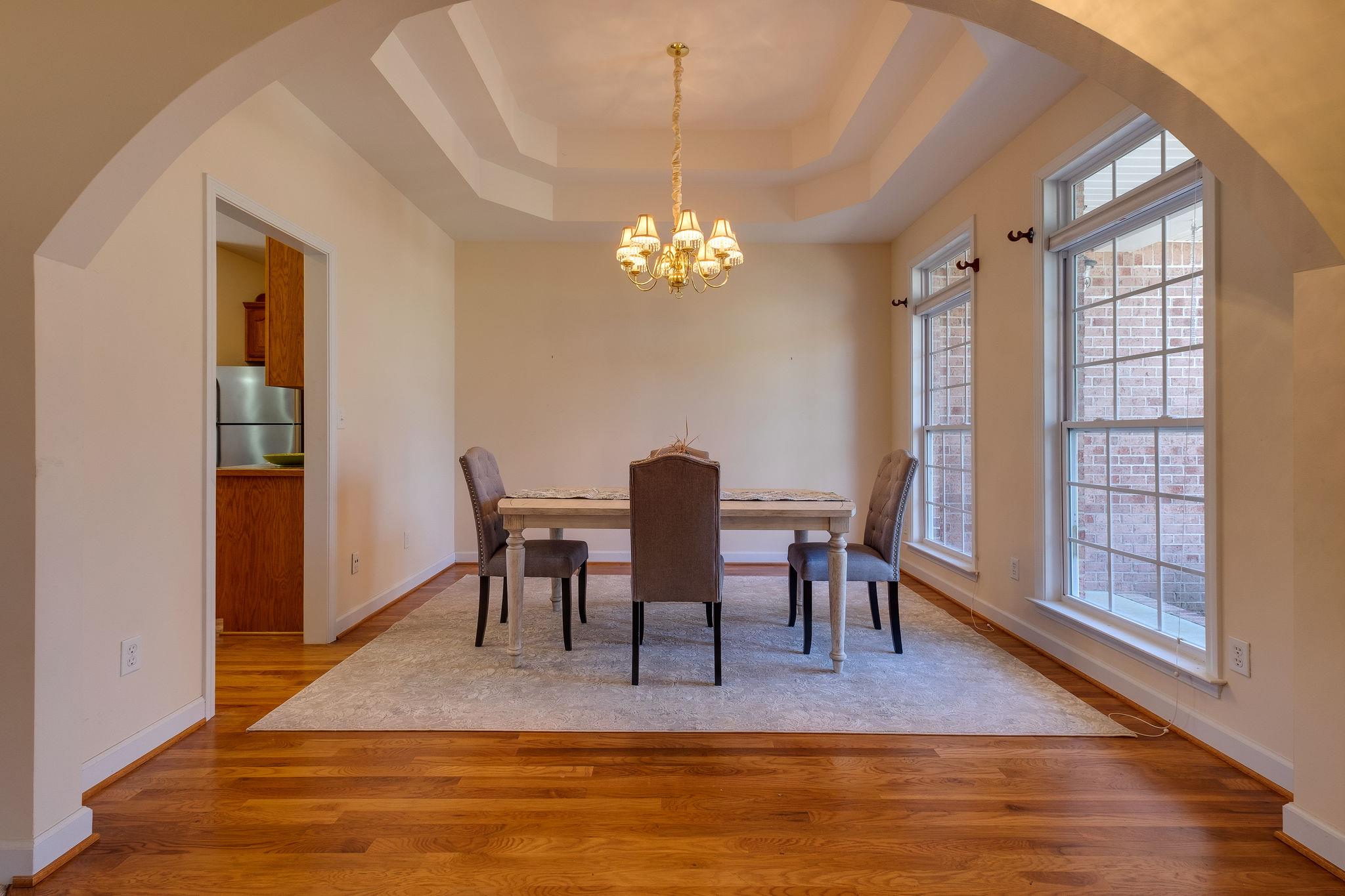 1175 Tidwell Switch Road Dickson, TN 37055 - Photo 5 of 27 a view of a dining room with furniture window and wooden floor