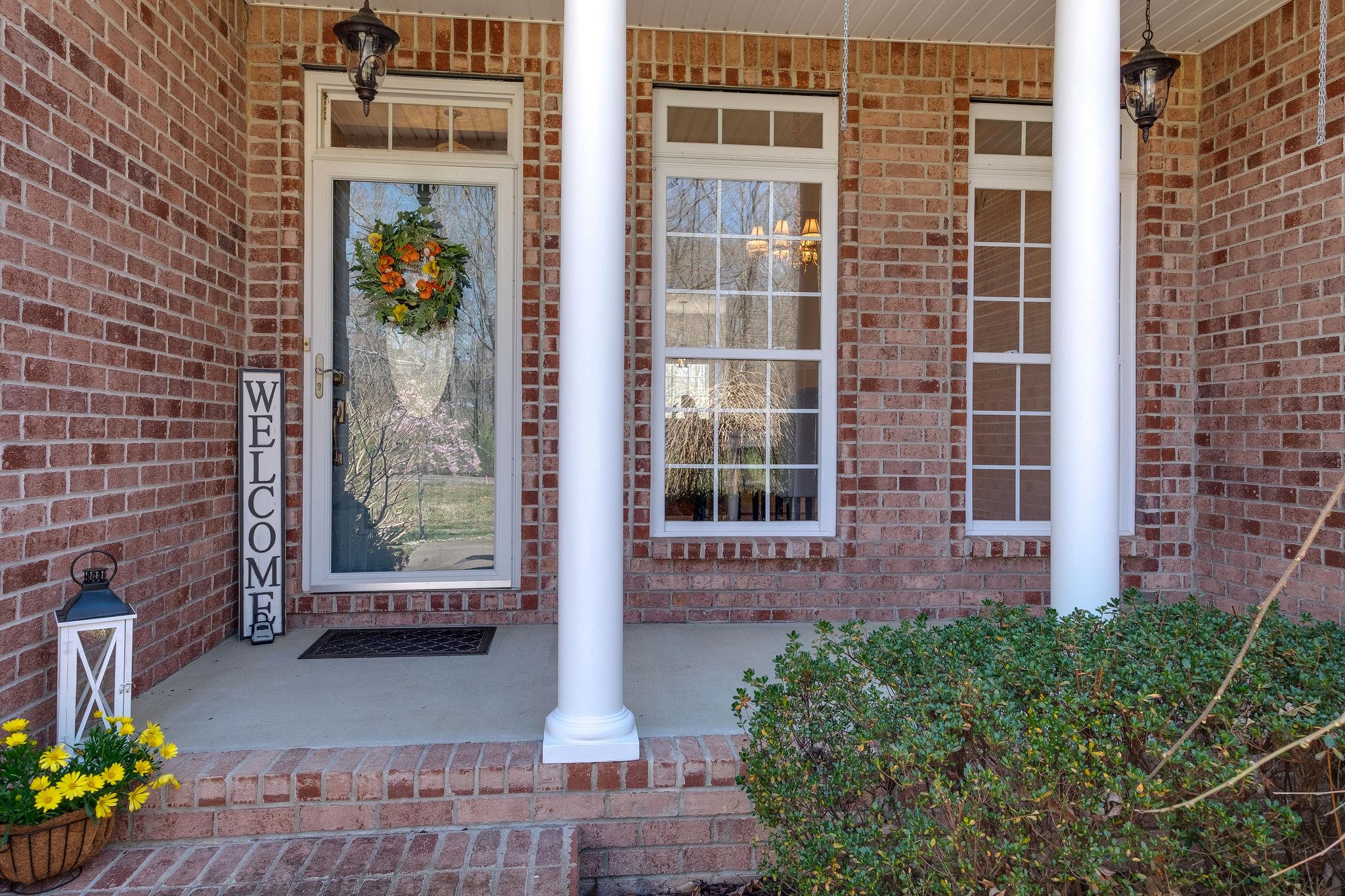 1175 Tidwell Switch Road Dickson, TN 37055 - Photo 10 of 27 a front view of a house with a yard