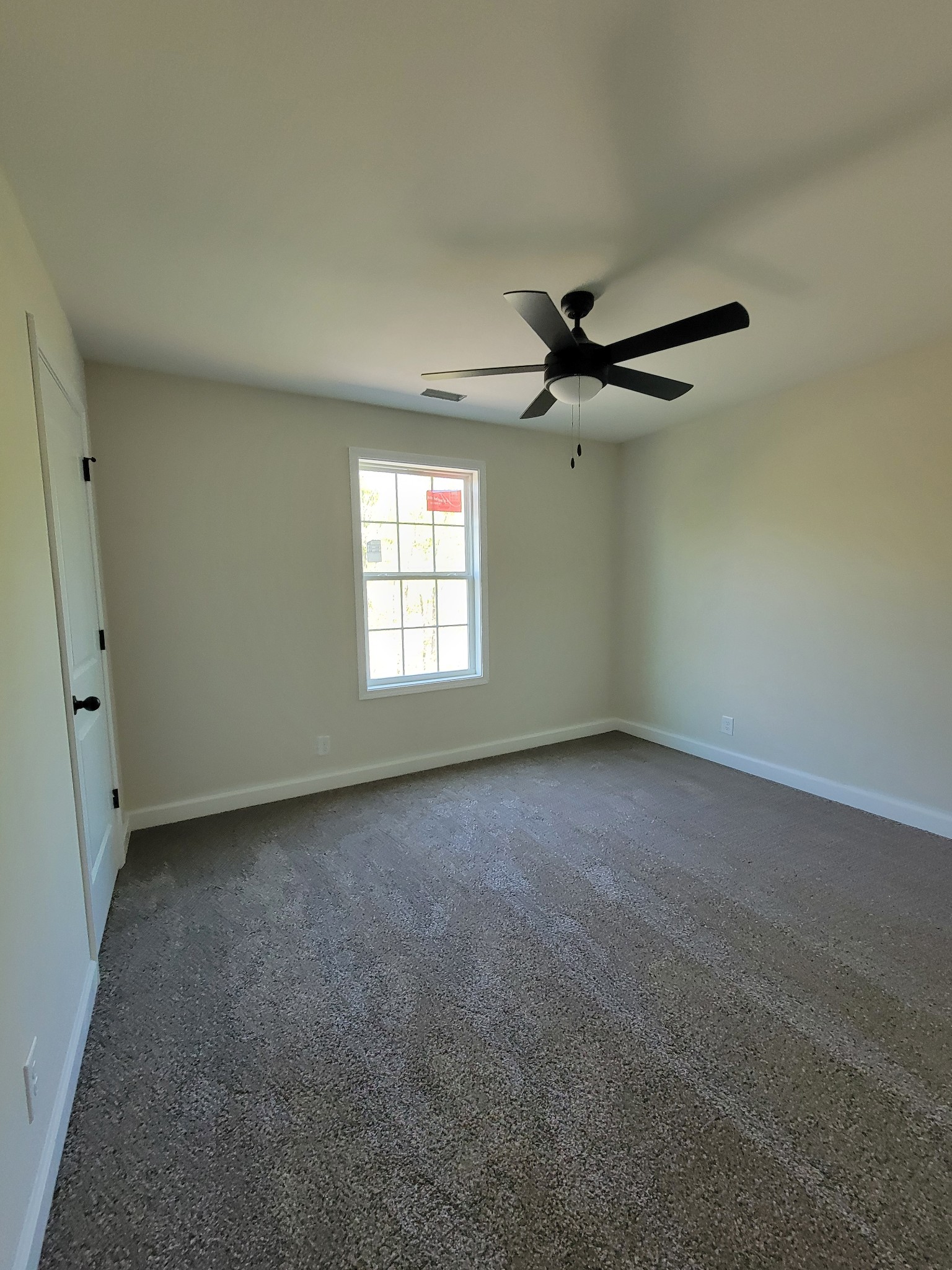 2265 Mockingbird Hill Road Palmyra, TN 37142 - Photo 16 of 24 a view of an empty room with a window