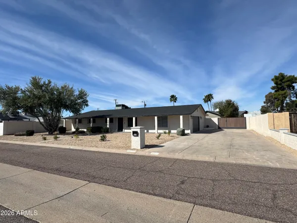 a house view with a outdoor space