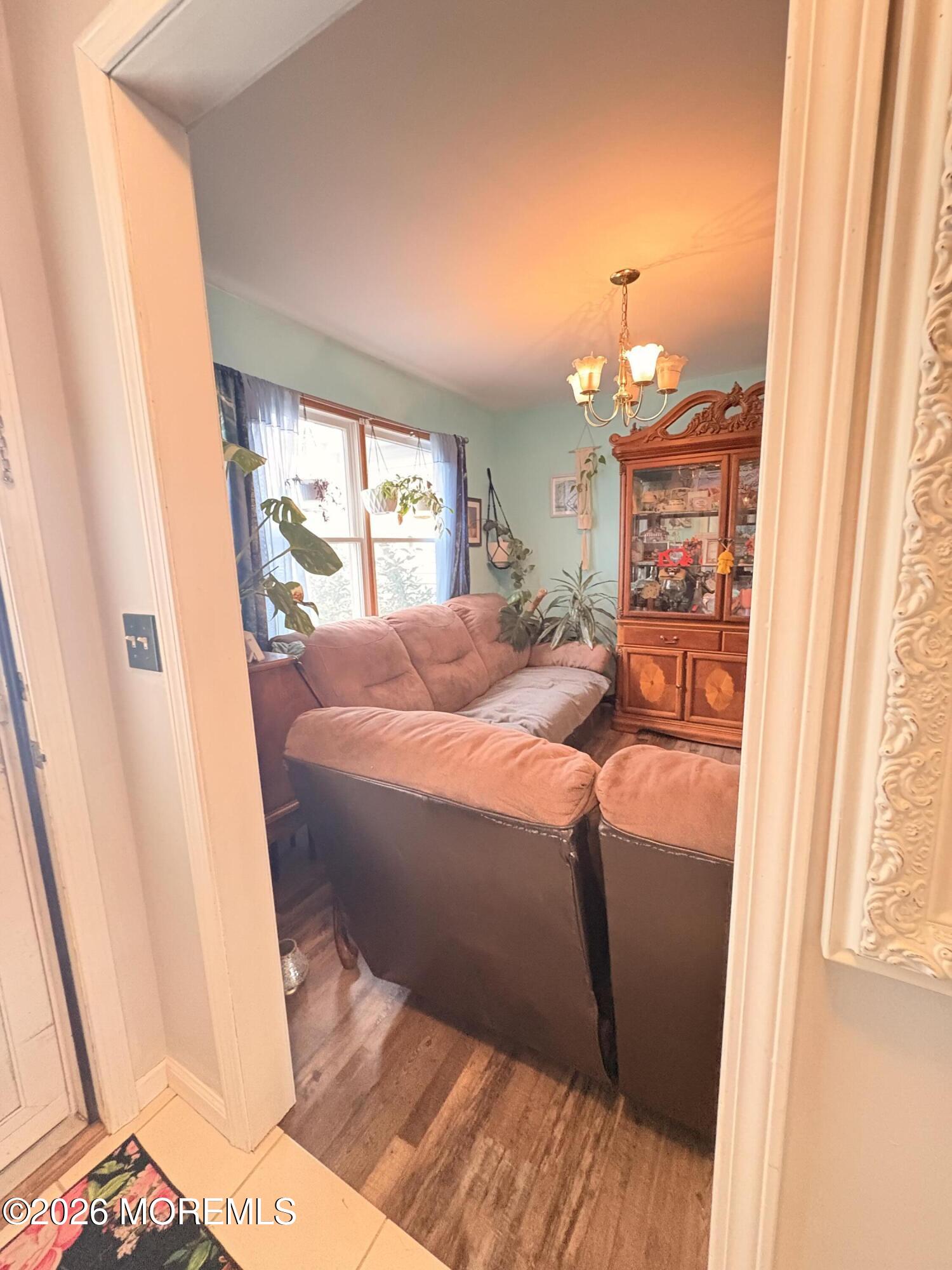 456 Dock Road Forked River, NJ 08731 - Photo 4 of 14 a bed sitting in a bedroom next to a window