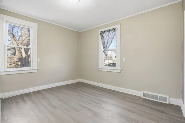 a view of room with window and workspace