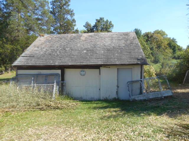 4236 Clover Hollow Road Slatington, PA 18080 - Photo 4 of 16 garage with slate roof and loft storage