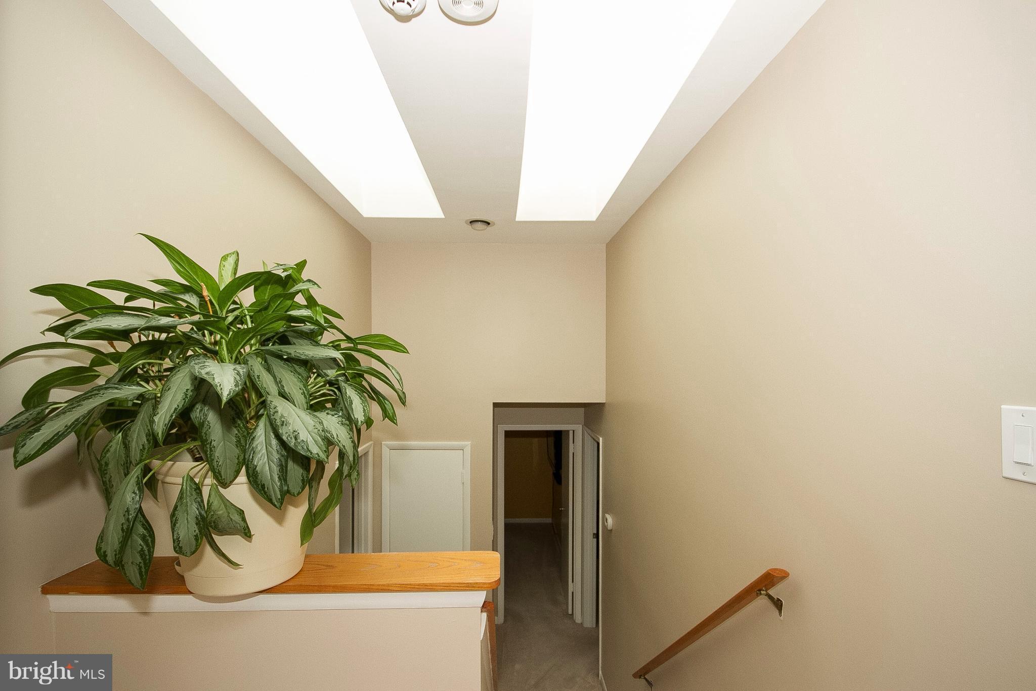 5541 Suffield Court Columbia, MD 21044 - Photo 22 of 30 2 skylights upper hallway