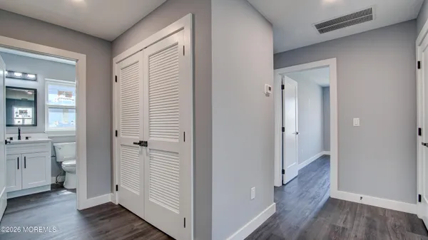 a view of a bathroom from the hallway
