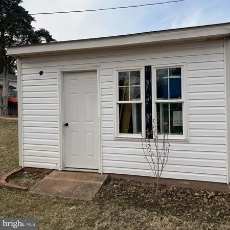 a view of a house with white door