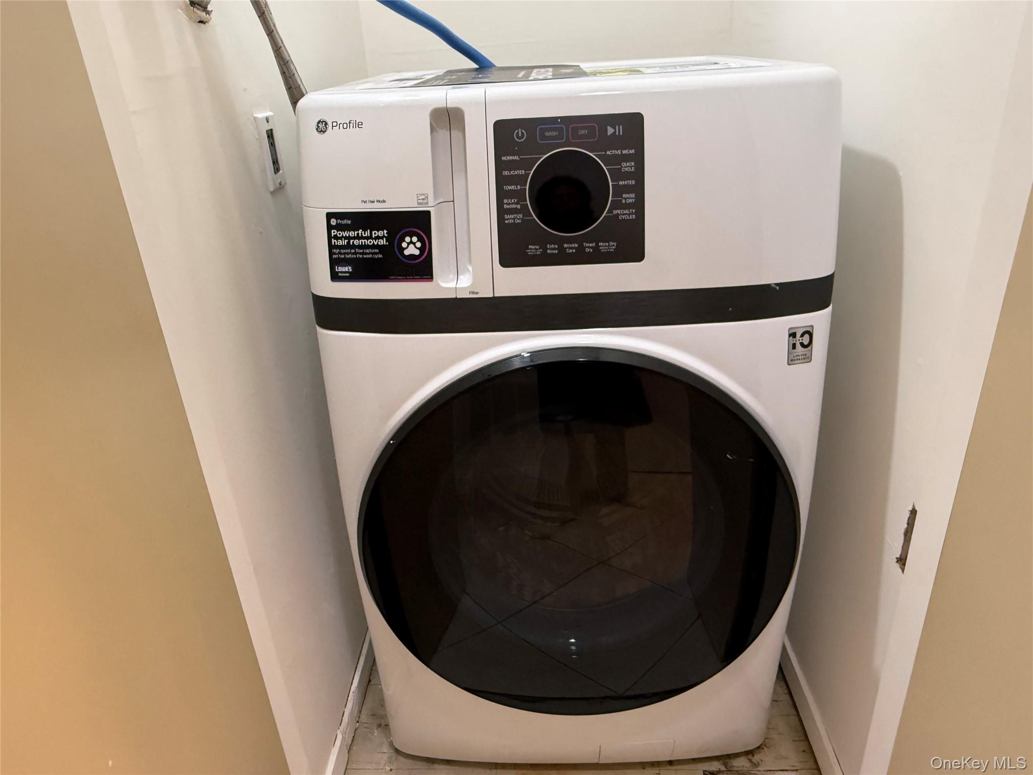 130 South Middle Neck Road, Unit 2 Great Neck, NY 11021 - Photo 11 of 22 a utility room with dryer and washer