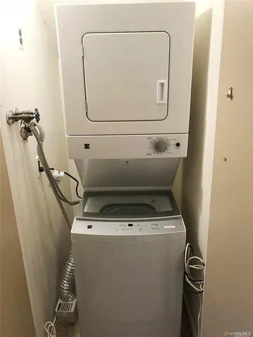 a view of backyard with fountain and outdoor seating