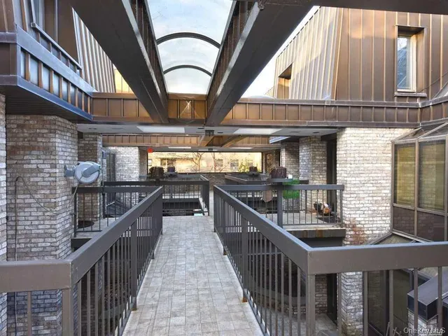 a kitchen with a sink and a refrigerator