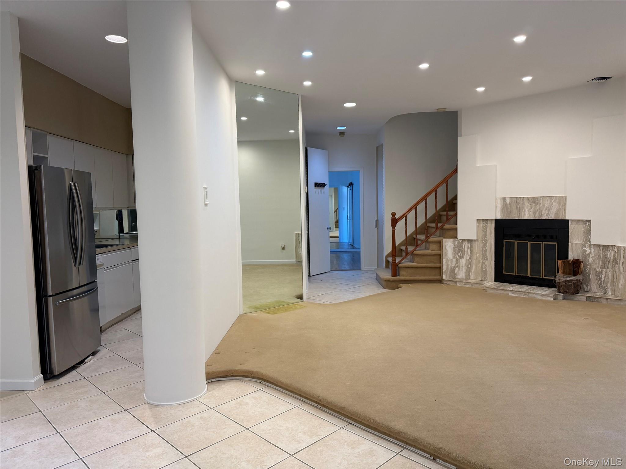 130 South Middle Neck Road, Unit 2 Great Neck, NY 11021 - Photo 5 of 22 a view of a hallway with staircase