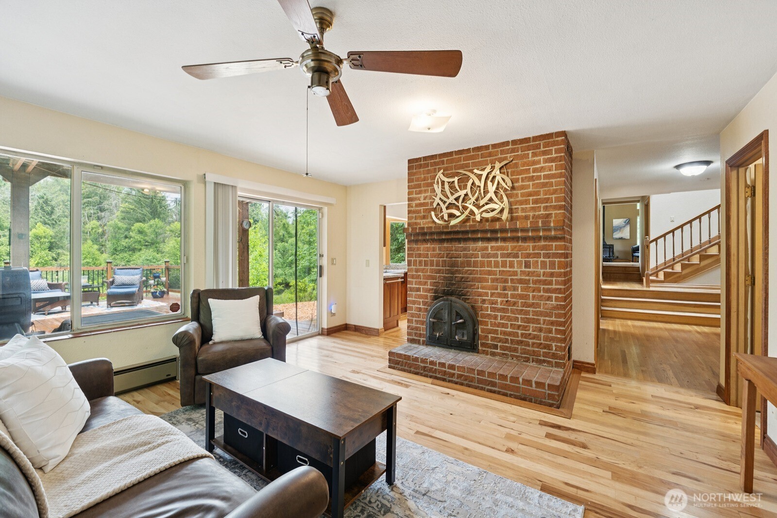 45908 Southeast Edgewick Road North Bend, WA 98045 - Photo 15 of 40 a living room with furniture and a fireplace