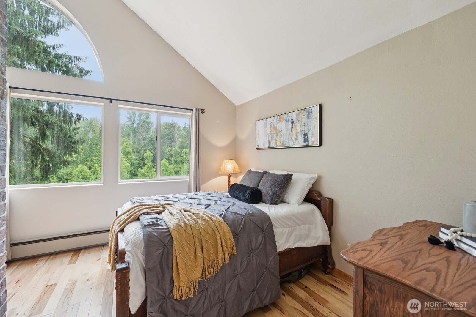 45908 Southeast Edgewick Road North Bend, WA 98045 - Photo 20 of 40 a bed sitting in a bedroom next to a window