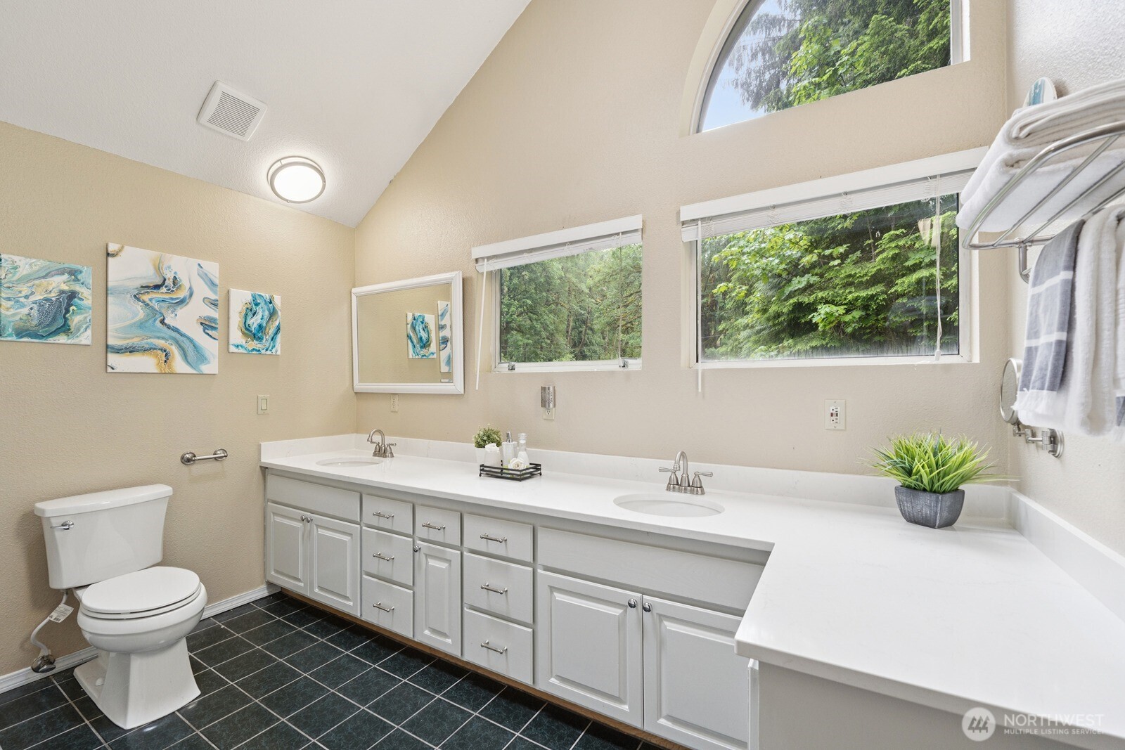 45908 Southeast Edgewick Road North Bend, WA 98045 - Photo 23 of 40 a bathroom with a toilet sink and mirror