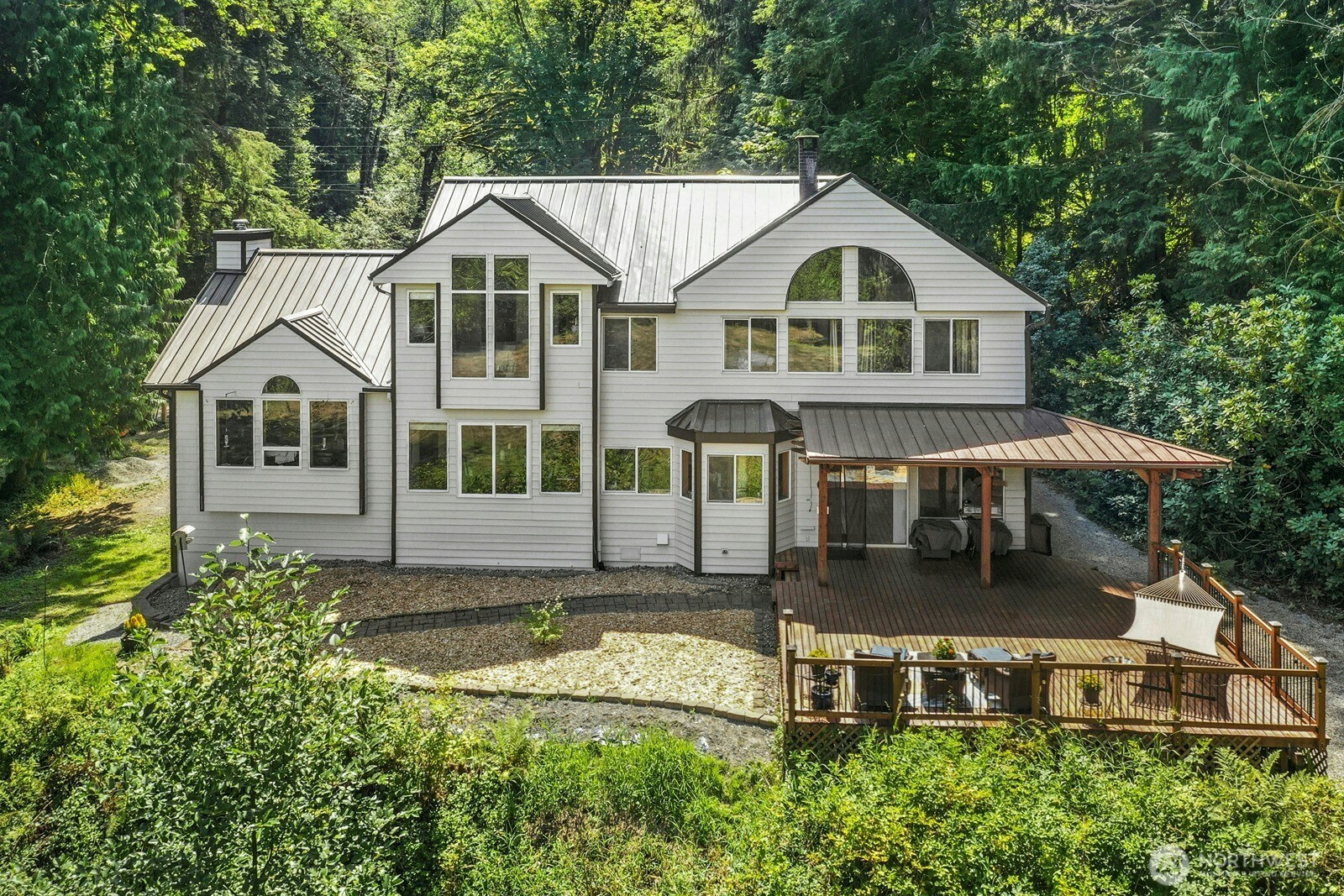45908 Southeast Edgewick Road North Bend, WA 98045 - Photo 4 of 40 a front view of a house with a yard balcony