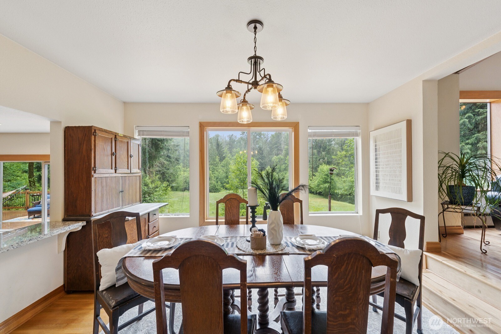 45908 Southeast Edgewick Road North Bend, WA 98045 - Photo 9 of 40 a view of a dining room with furniture window and outside view