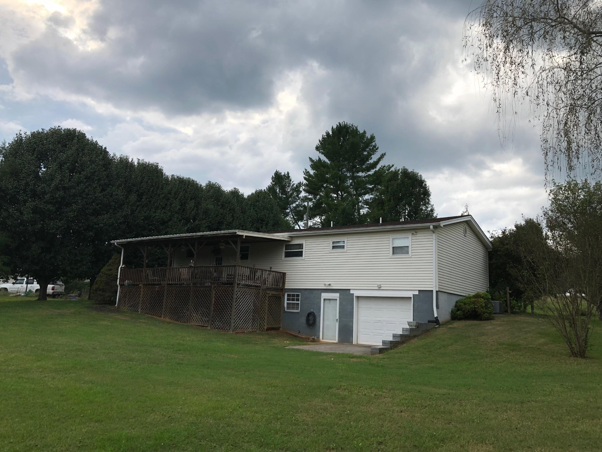 10034 Rutledge Pike Corryton, TN 37721 - Photo 8 of 10 a view of a house with backyard