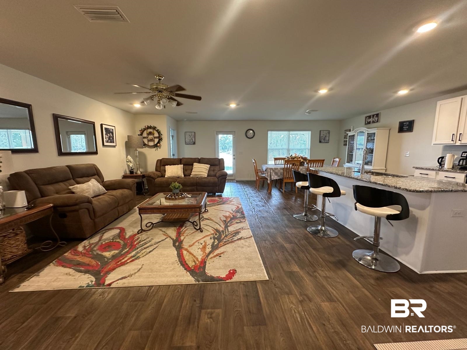 23792 Unbridled Loop Daphne, AL 36526 - Photo 5 of 36 Living area featuring recessed lighting, dark wood-style floors, and a ceiling fan