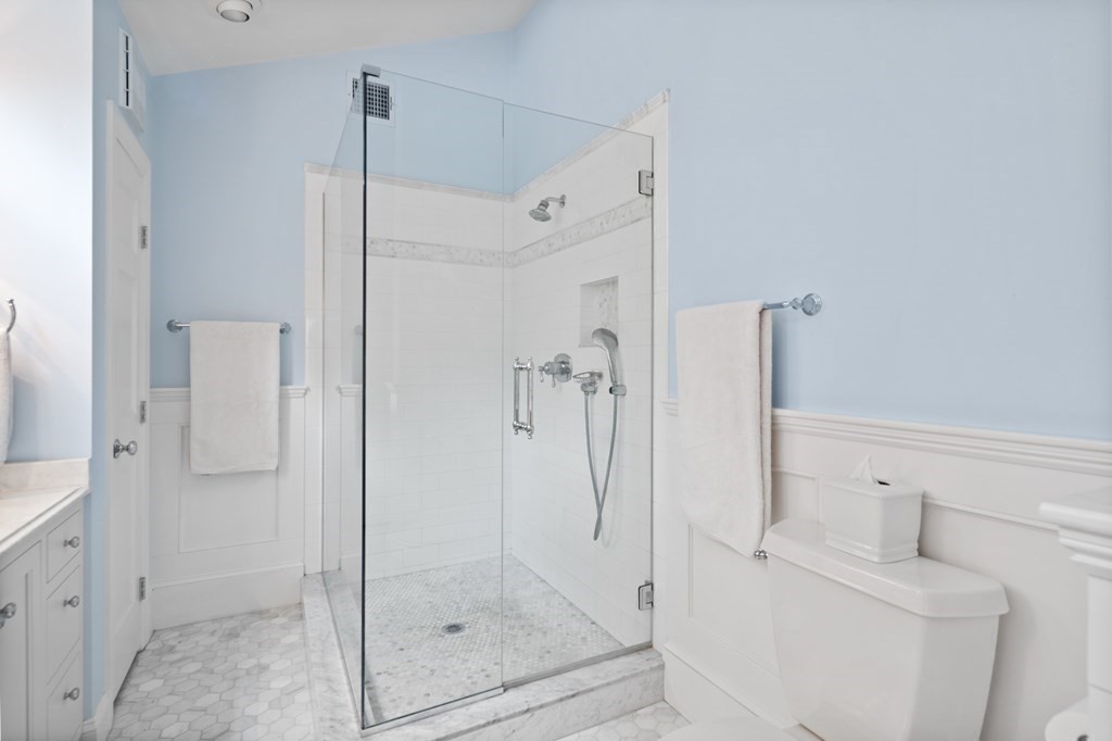 6 Bishops Lane Hingham, MA 02043 - Photo 11 of 22 a bathroom with a shower and toilet
