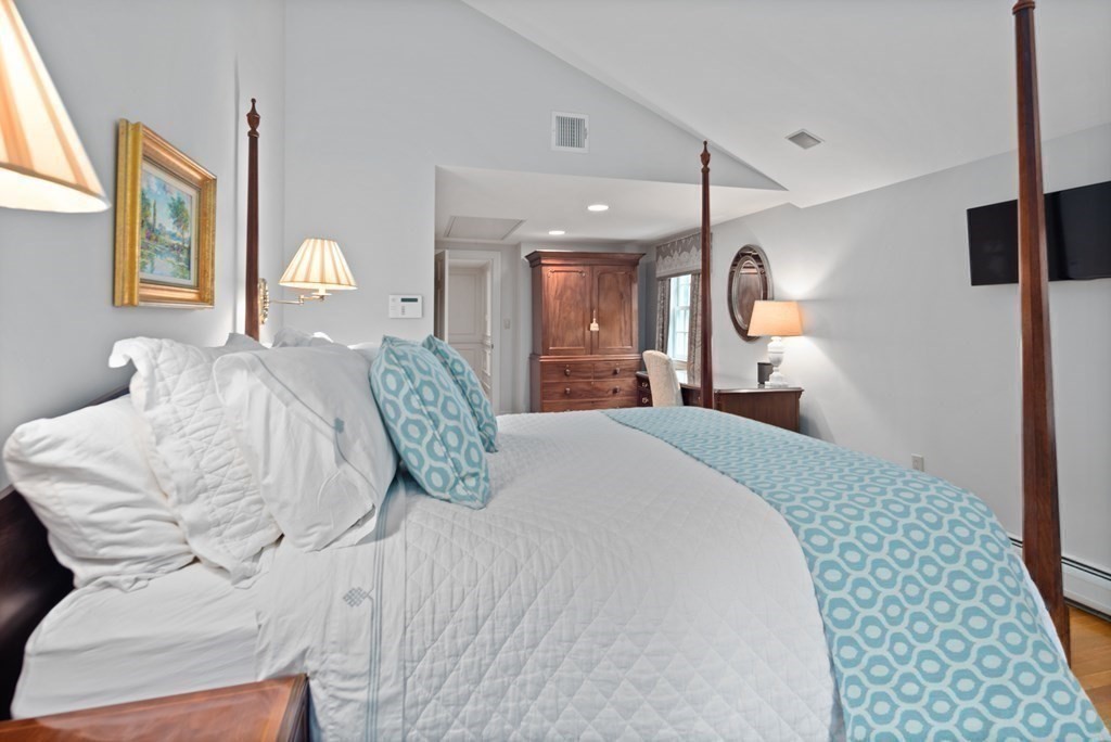 6 Bishops Lane Hingham, MA 02043 - Photo 12 of 22 a bedroom with a bed window and wall painting