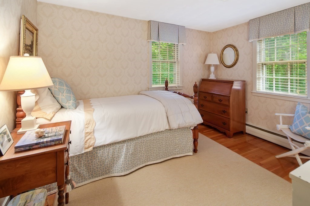 6 Bishops Lane Hingham, MA 02043 - Photo 13 of 22 a bed room with a bed and a window