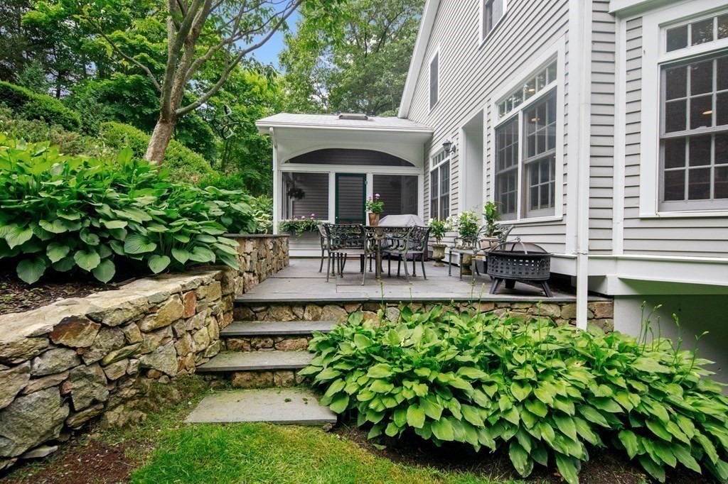 6 Bishops Lane Hingham, MA 02043 - Photo 17 of 22 a front view of a house with garden