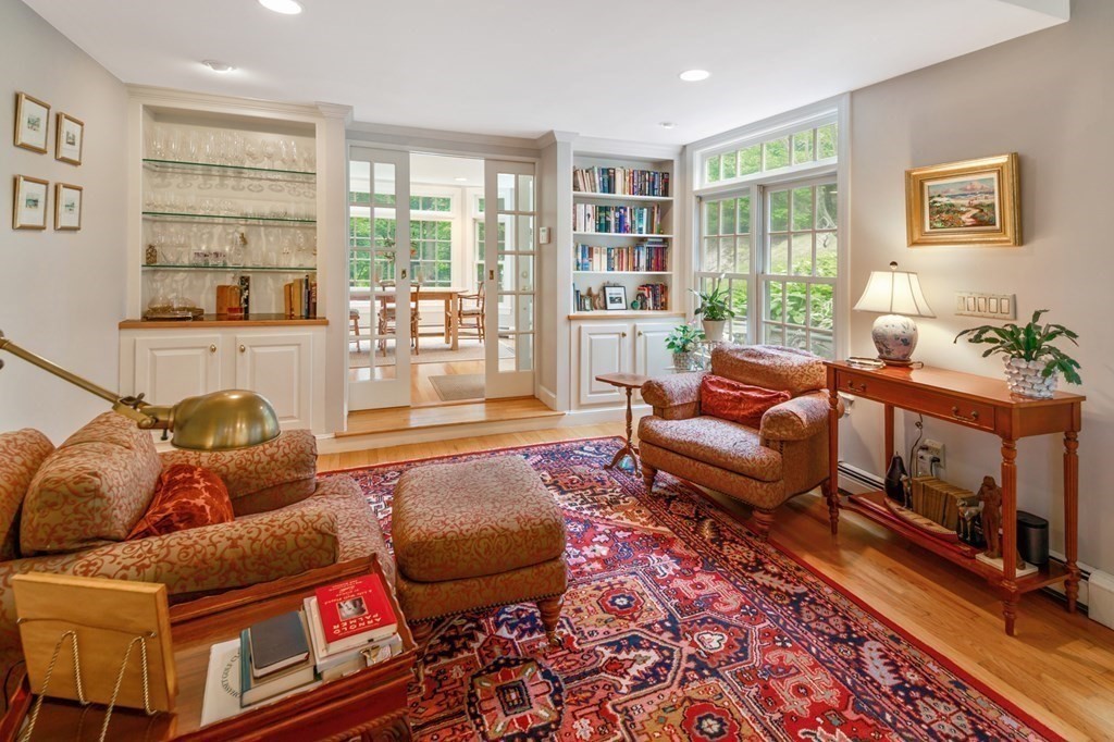 6 Bishops Lane Hingham, MA 02043 - Photo 5 of 22 a living room with furniture and a floor to ceiling window