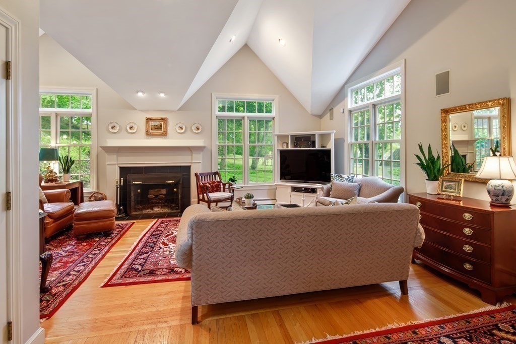 6 Bishops Lane Hingham, MA 02043 - Photo 6 of 22 a living room with furniture large window and a fireplace