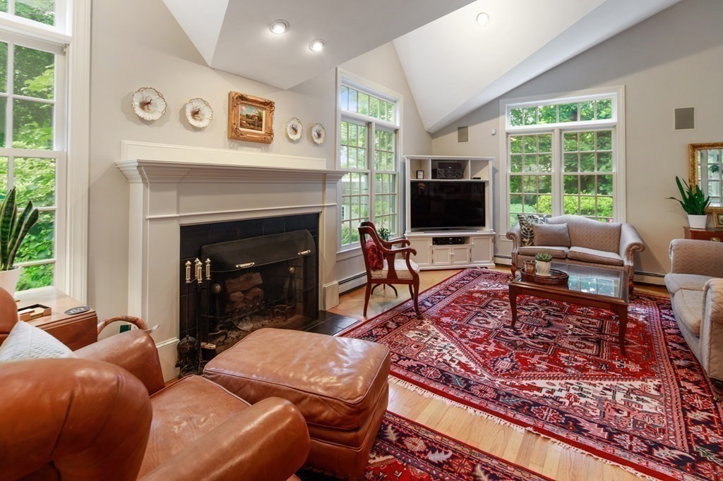6 Bishops Lane Hingham, MA 02043 - Photo 7 of 22 a living room with furniture large window and a fireplace