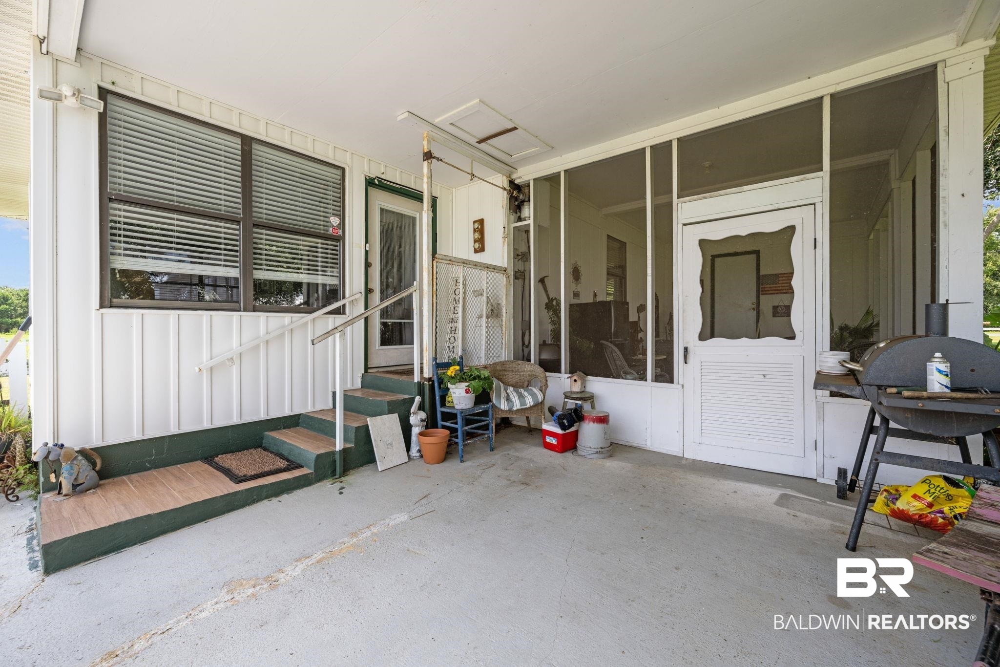 13643 County Road 3 Fairhope, AL 36532 - Photo 8 of 50 Carport and screened patio of 3bed/2bath home