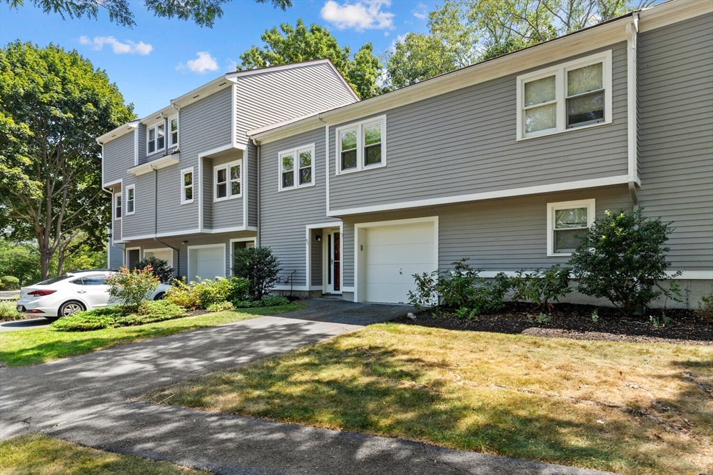 9 Fillmore Road, Unit 9C Salem, MA 01970 - Photo 2 of 22 a view of a house with a yard