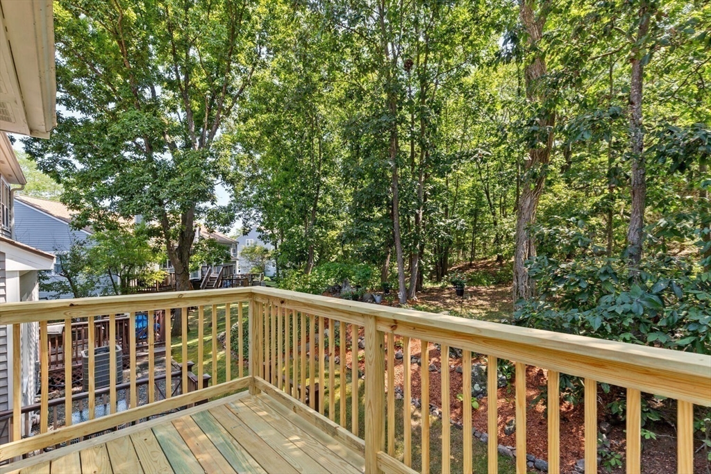 9 Fillmore Road, Unit 9C Salem, MA 01970 - Photo 7 of 22 a view of balcony with wooden floor