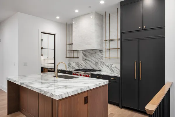 a kitchen with a sink and cabinets