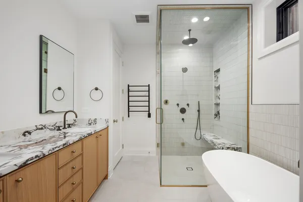 a bathroom with a shower and toilet