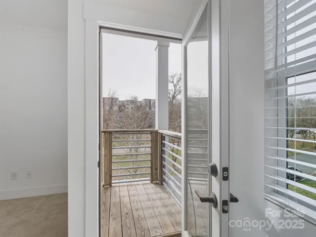 a view of a room with a large window