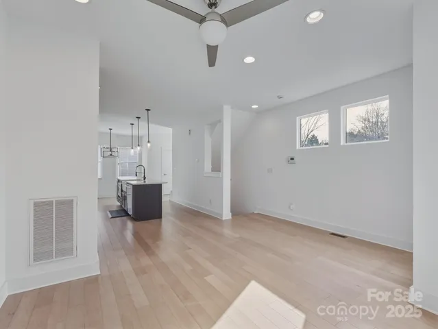 a view of kitchen and windows